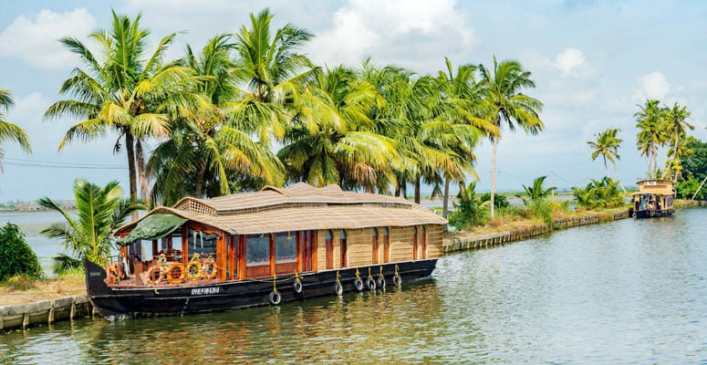 Houseboat cruising on the scenic backwaters of Alleppey