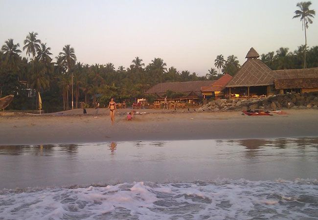 Take part in Yoga sessions and ancient Ayurveda massage at Palm Tree Heritage resort in Kerala.