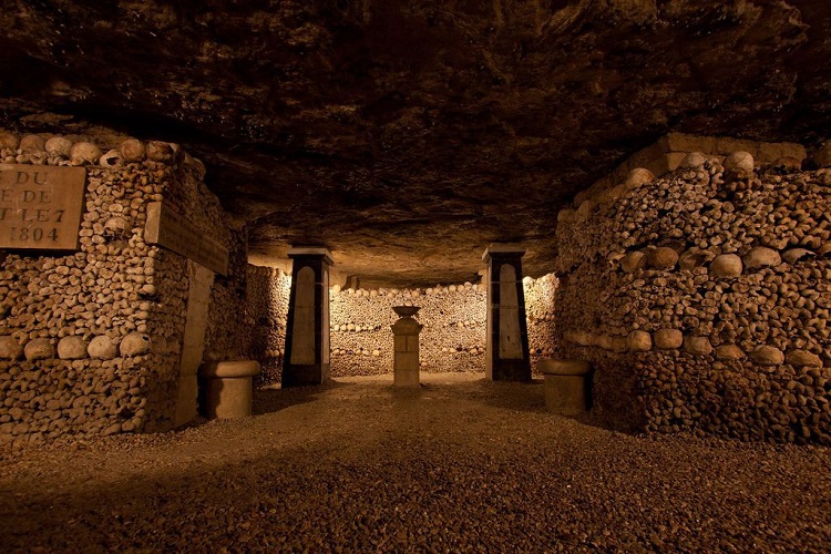 Carefully arranged bones in the paris Catacombs.