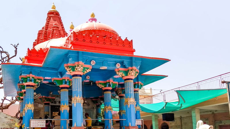 Brightly painted blue and red architecture of the Brahma Temple in Pushkar, Rajasthan