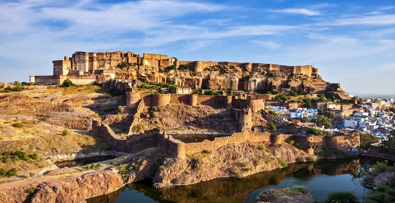 Panorammic view of Mehrangarh Fort perched on a cliff above the Blue City of Jodhpur with Jaswant Thada visible on the left